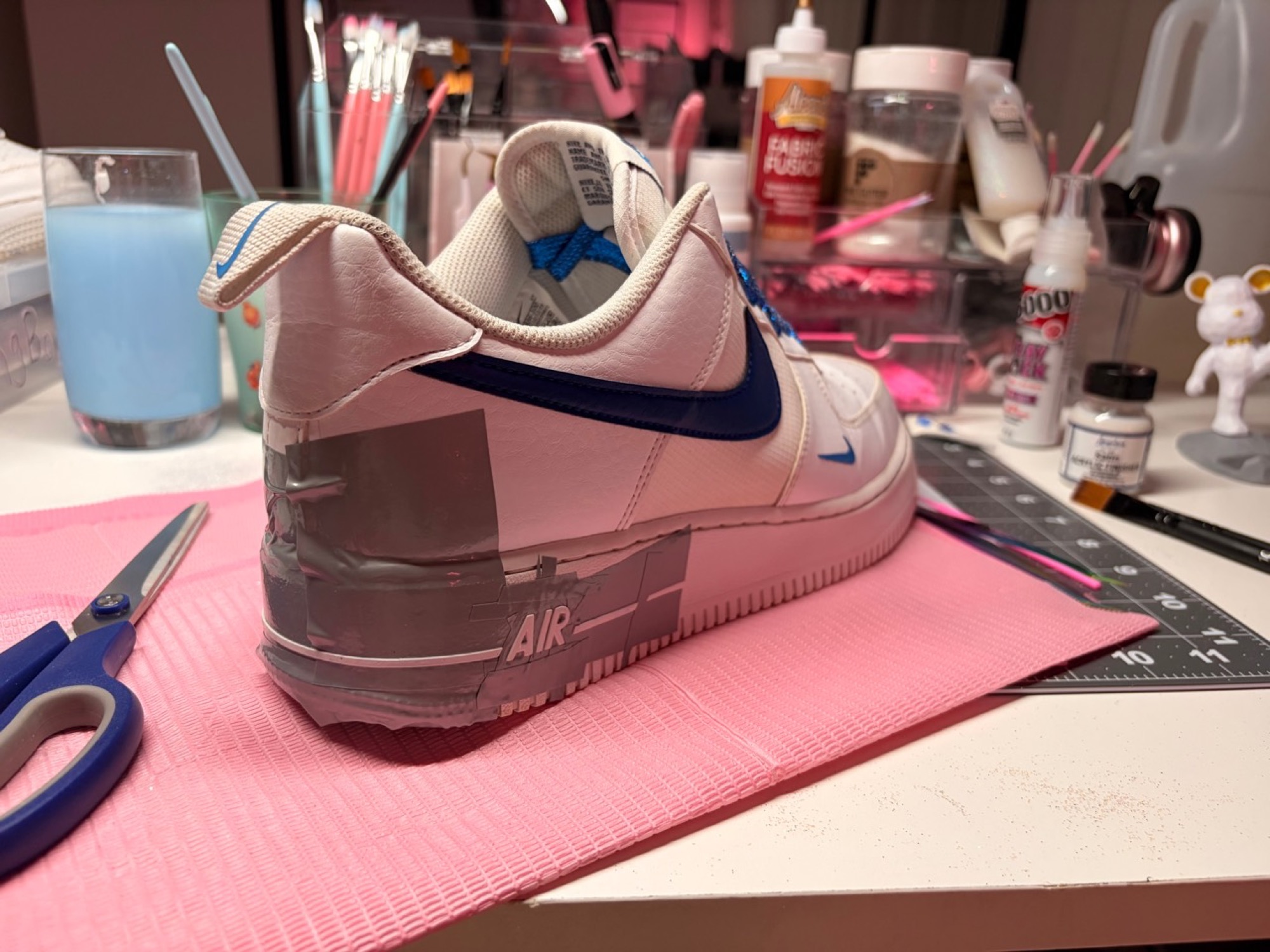 Masked blue Air Force 1 during the customisation process