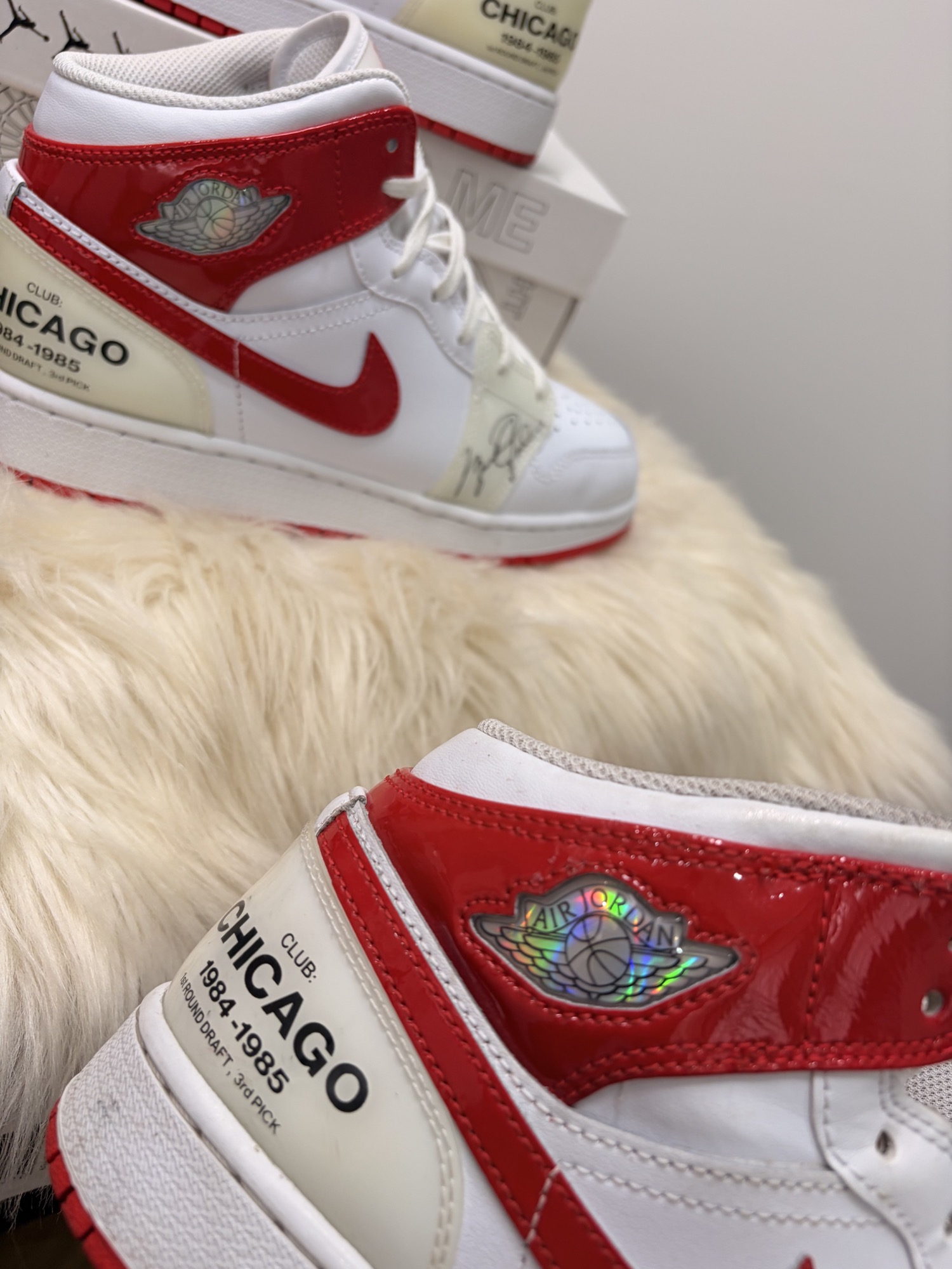 Restored patent red wing detail on the finished Chicago-inspired custom sneaker with laces