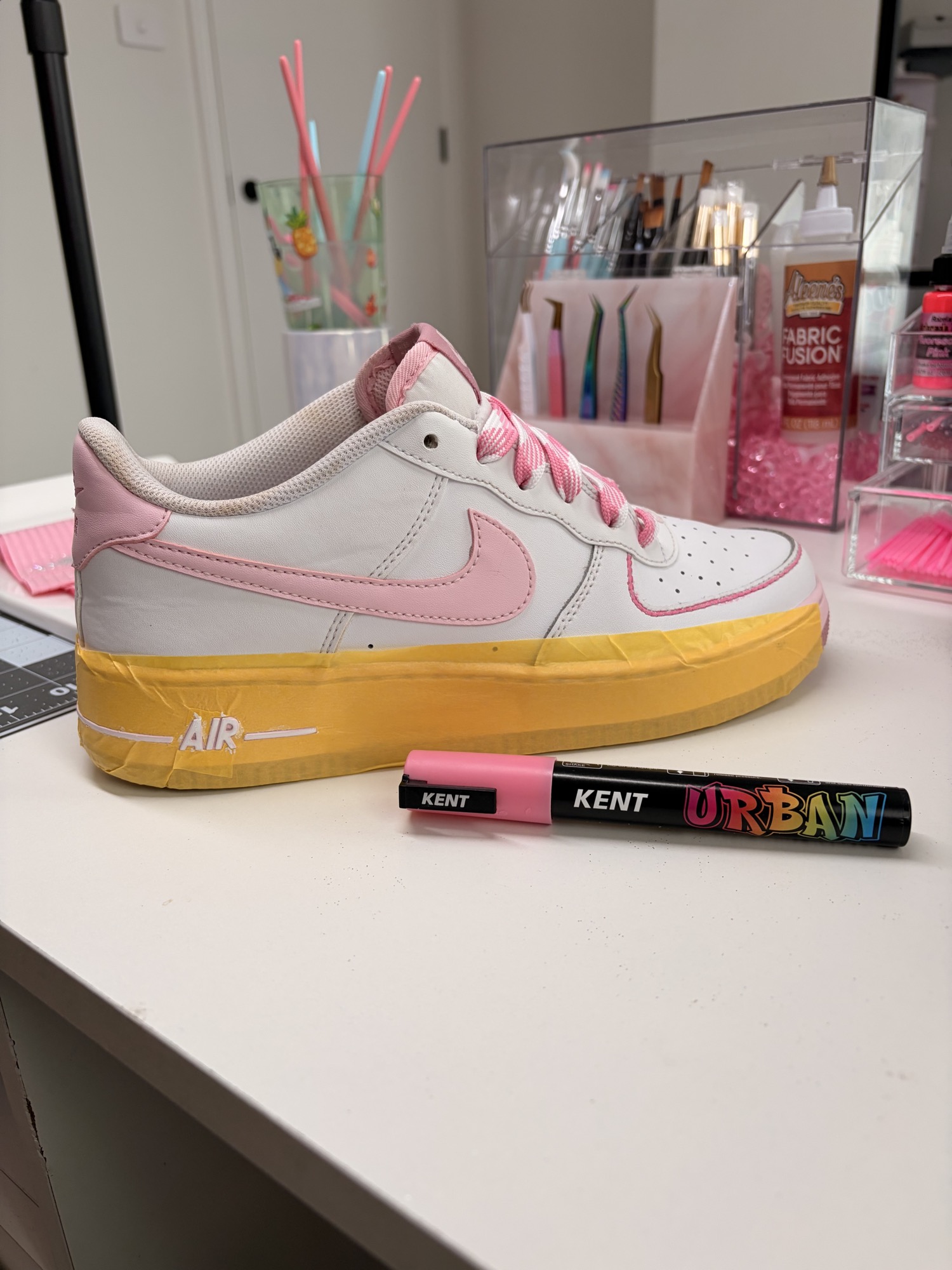 Pink Air Force 1 carefully masked during customisation
