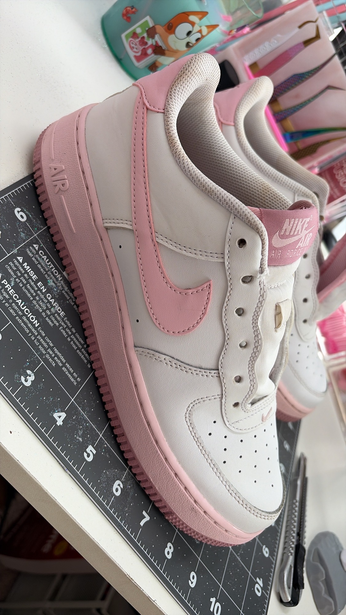 Pink Air Force 1 during restoration and colour preparation